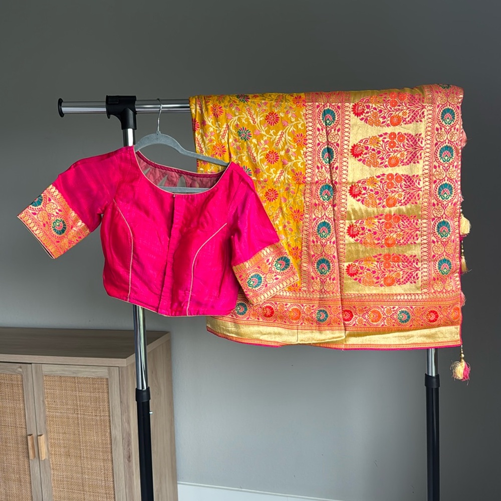 Vibrant Pink and Gold Embroidered saree with blouse